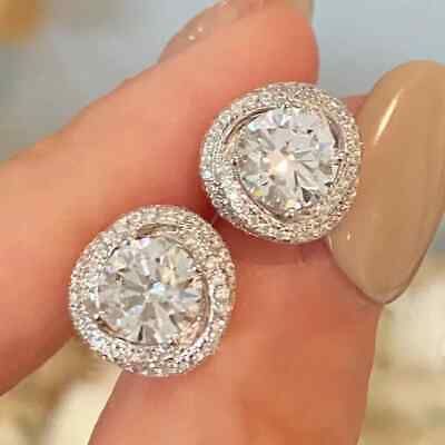 Cartier trinity ruban diamond studs.jpg