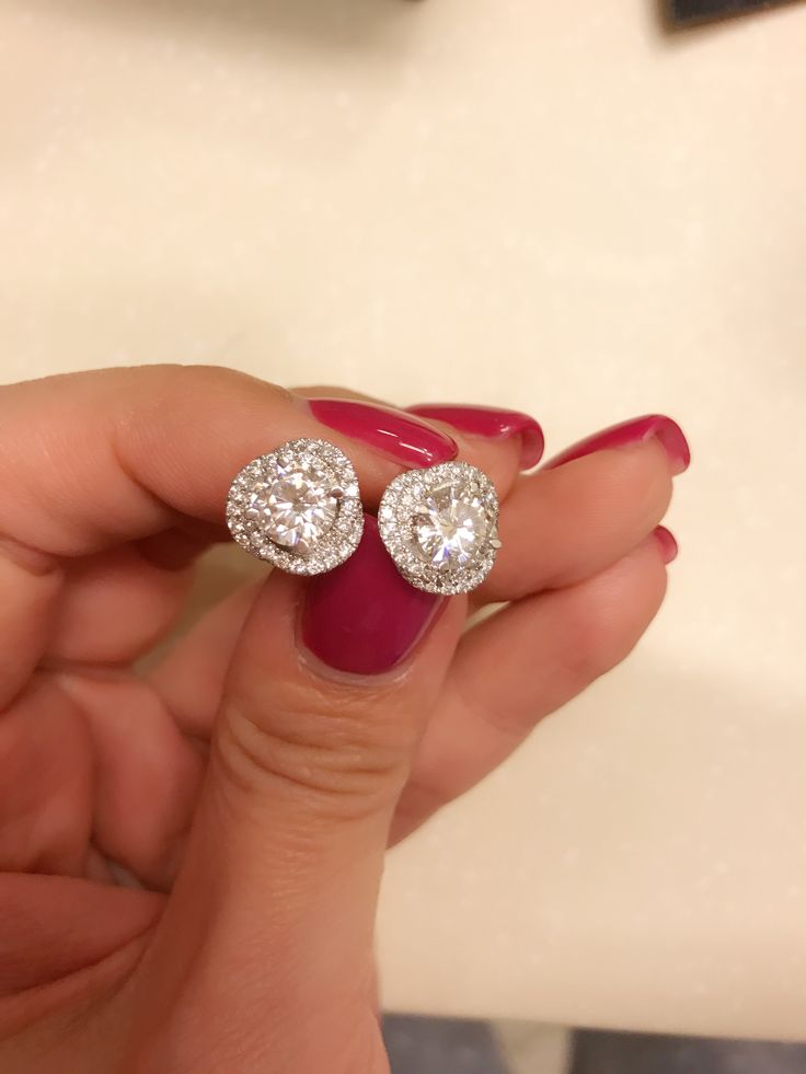 Cartier trinity ruban diamond studs.jpg