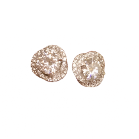 Cartier trinity ruban diamond studs.jpg